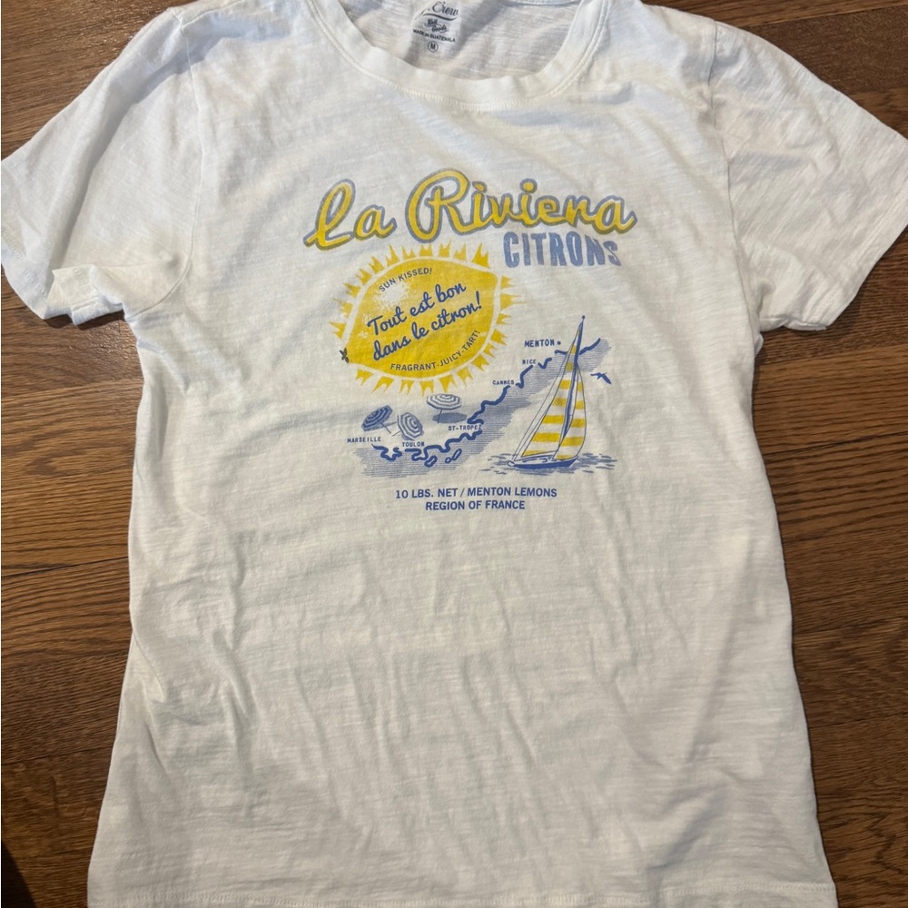 White Graphic Tee with Yellow and Blue Print. Like new excellent condition.